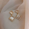 Elegant Cat's Eye Petal Tassel Drop Earrings